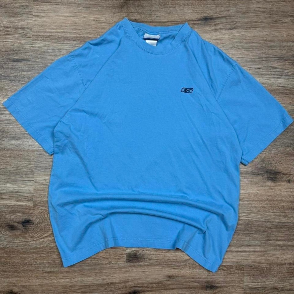 thick 90s reebok baby blue logo tee